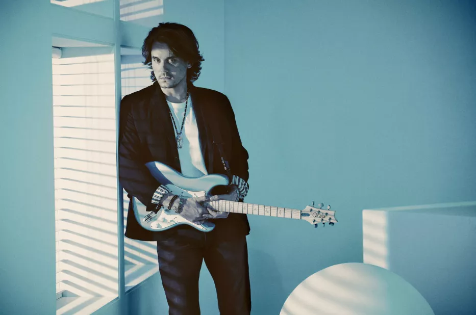 Ny vin på gamle flasker klæder John Mayer