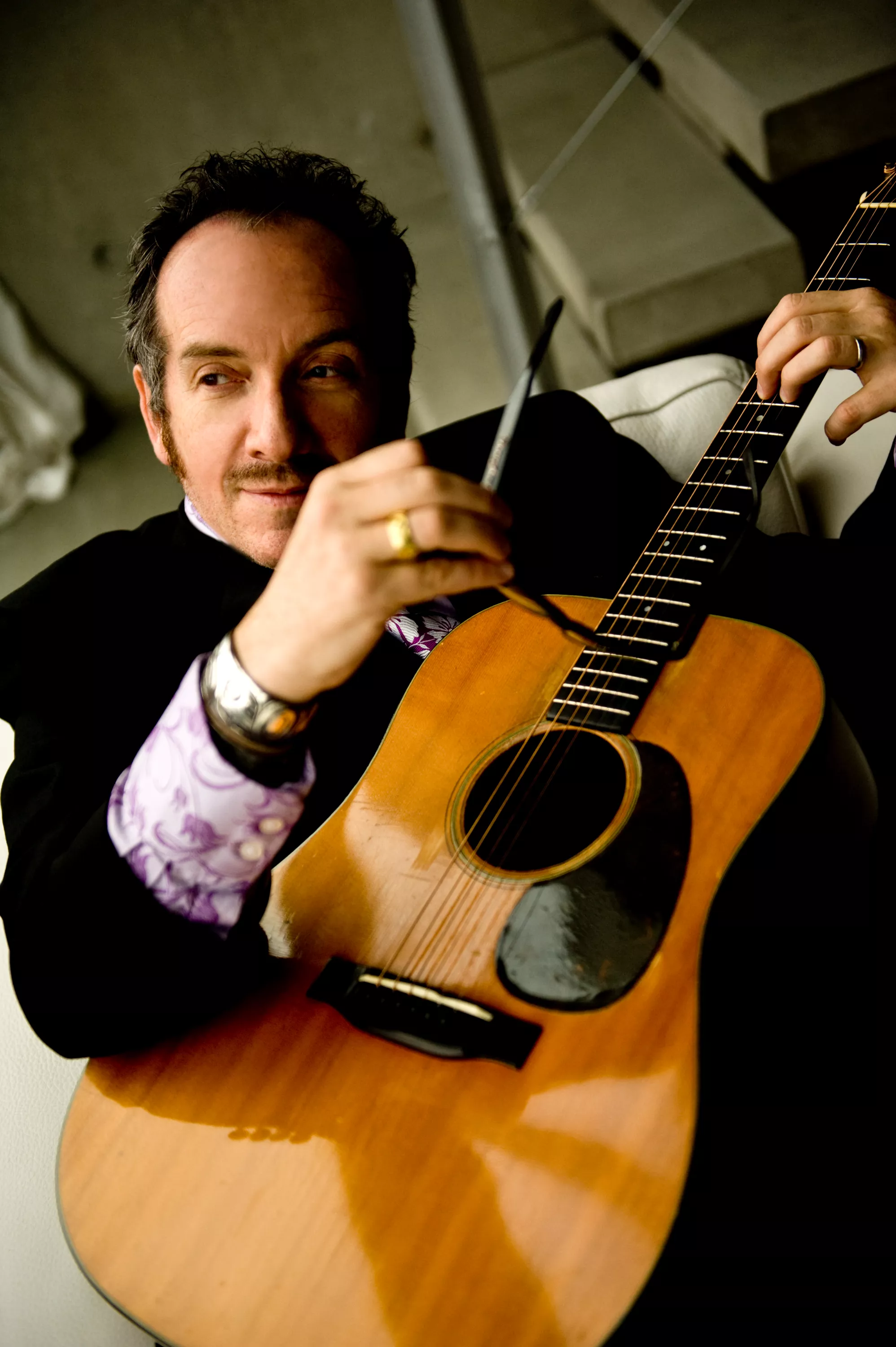 Elvis Costello fylder 60