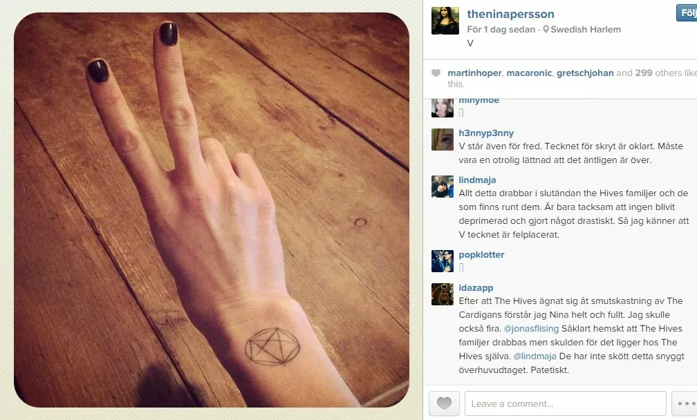 Nina Perssons V-tegn provokerer