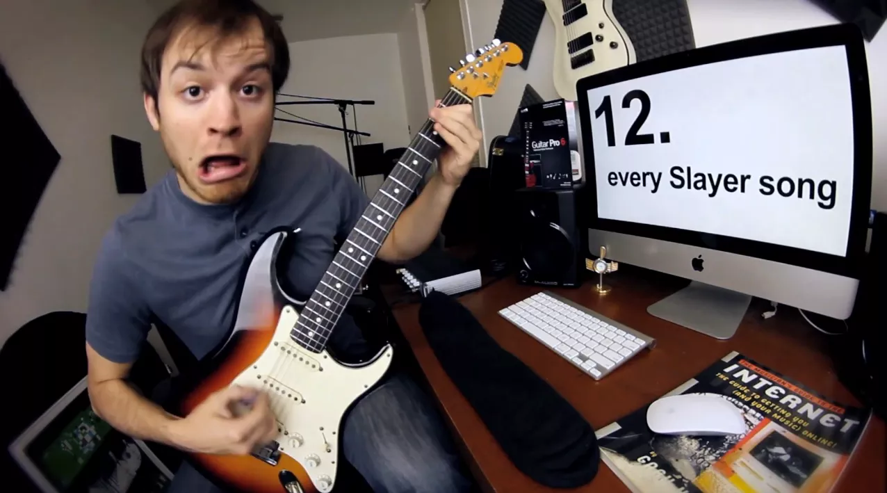 Se guitarist fyre 30 sange af på 1 minut