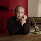 Paul Simon sagsøger ur-producent