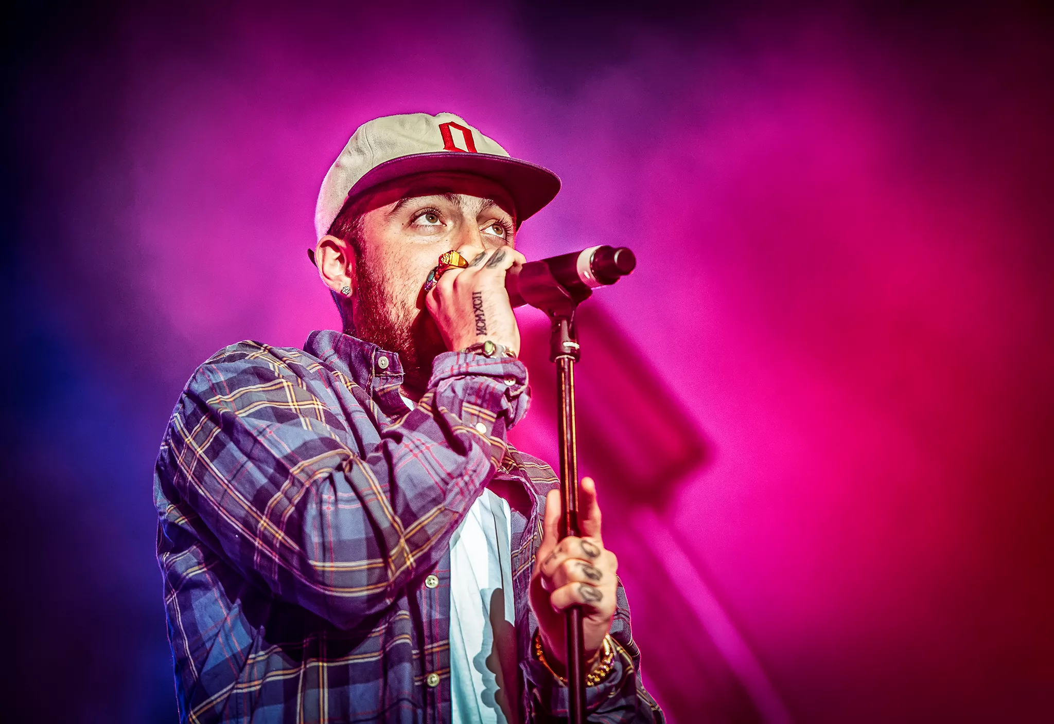 Tre gripna misstänkta för inblandning i rapparens död