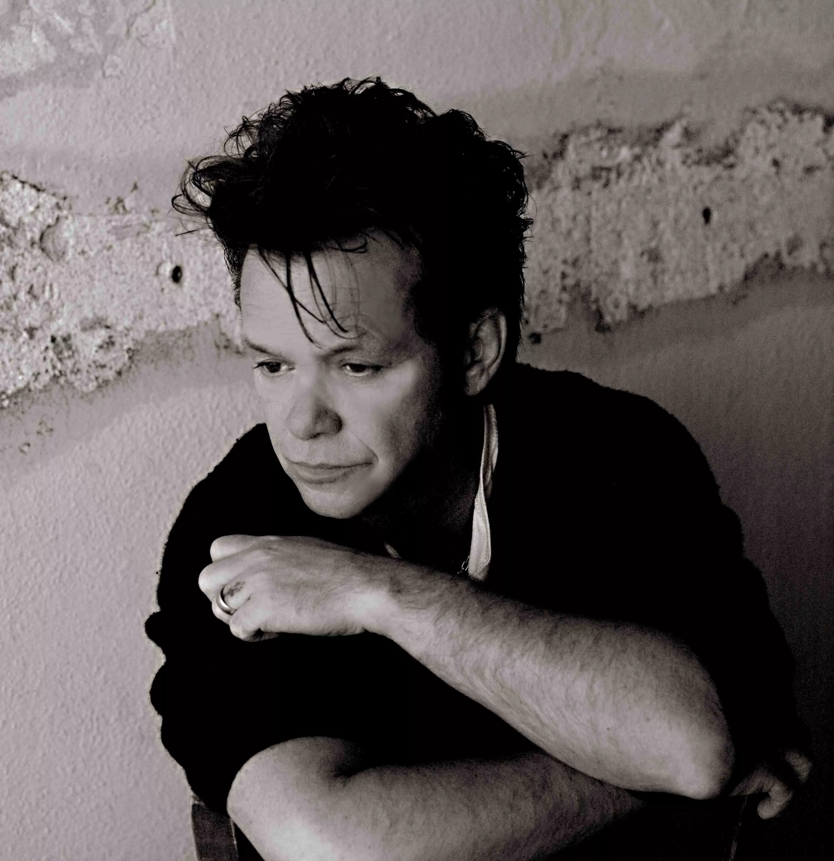 John Mellencamp varmer op med film